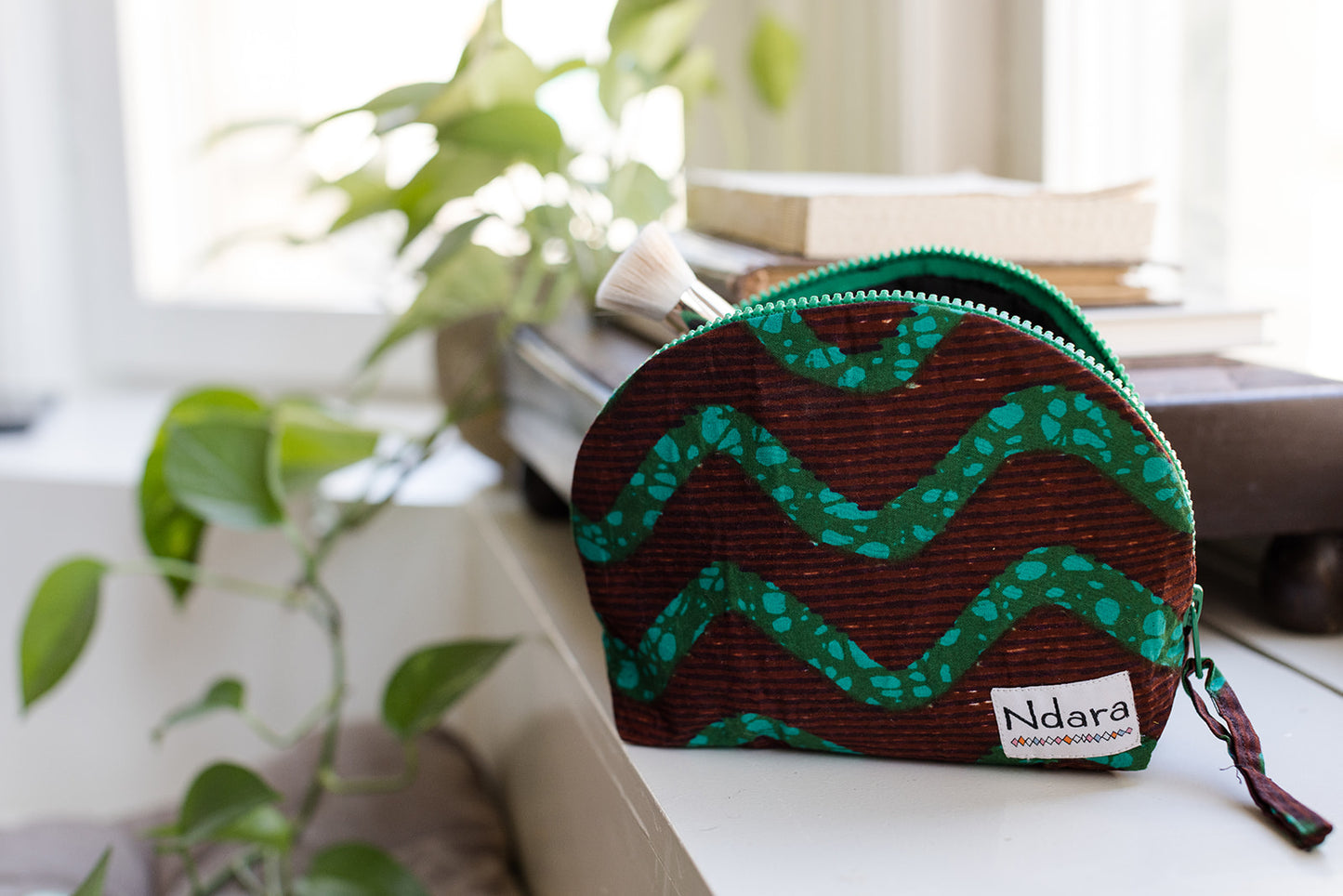 Jocelyne Curve Pouch in Green Stripes