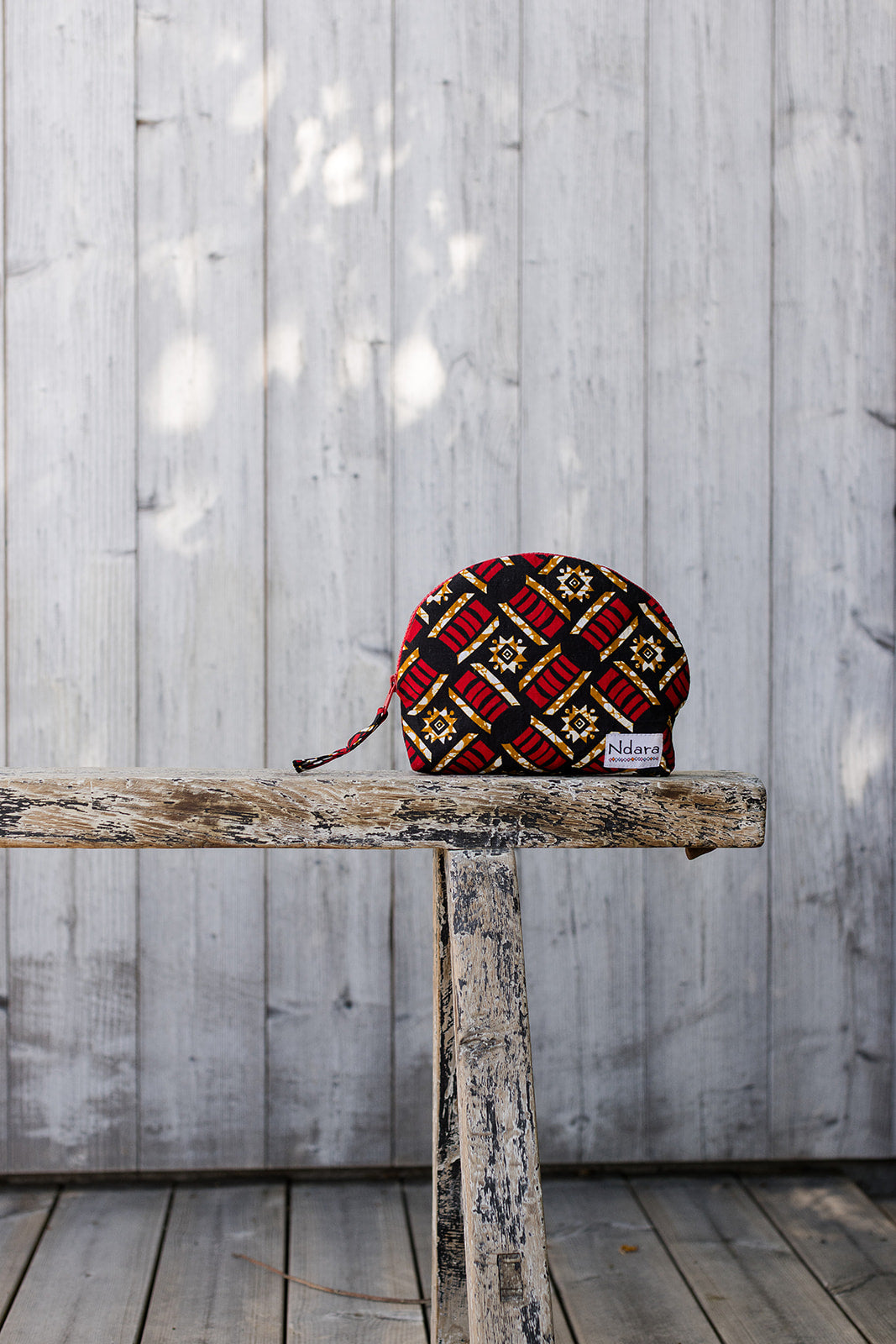 Jocelyne Curve Pouch in Red Pods