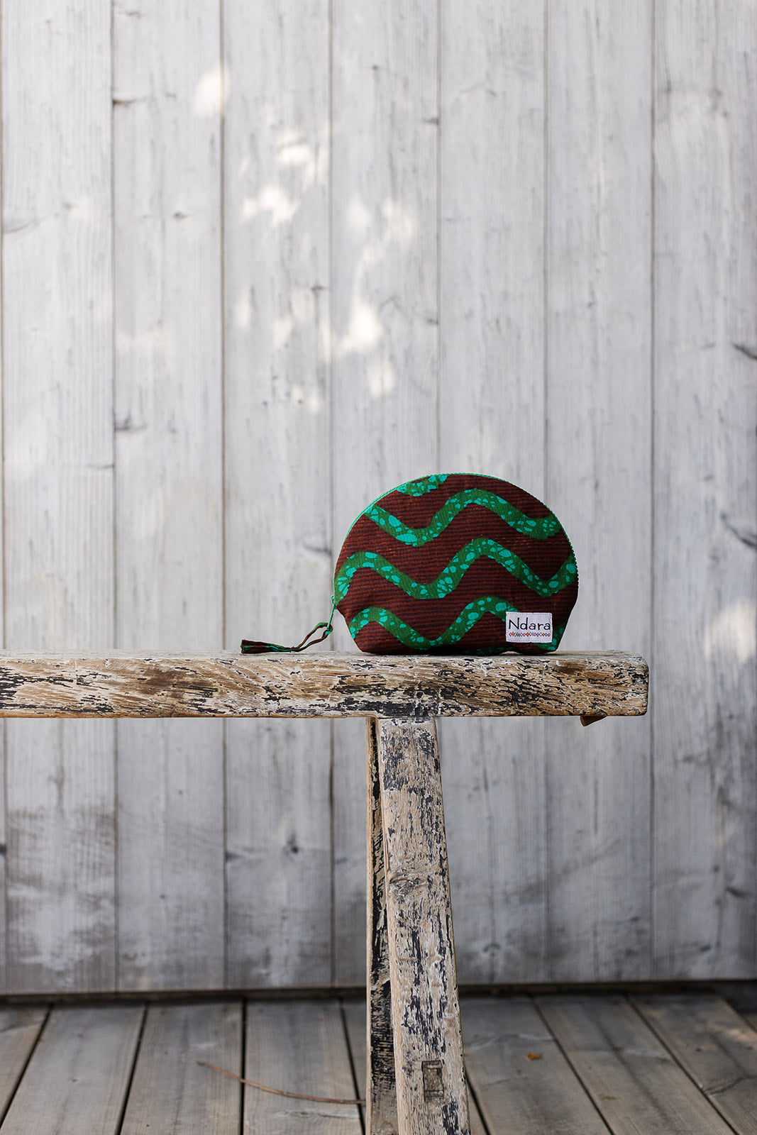Jocelyne Curve Pouch in Green Stripes