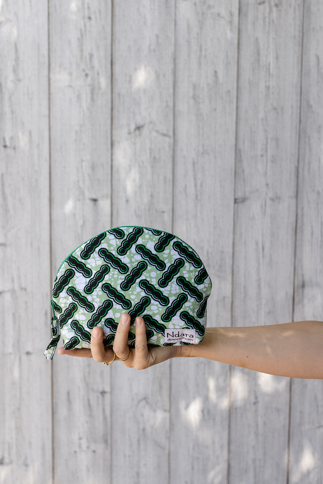 Jocelyne Curve Pouch in Green Beans