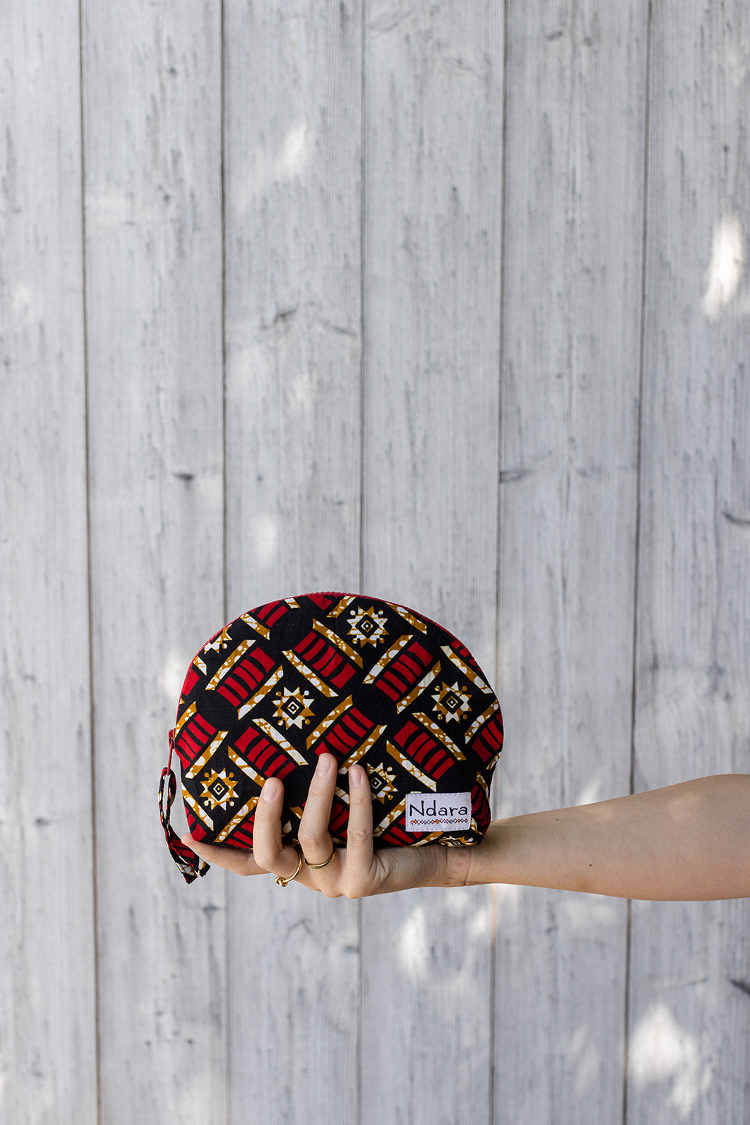Jocelyne Curve Pouch in Red Pods