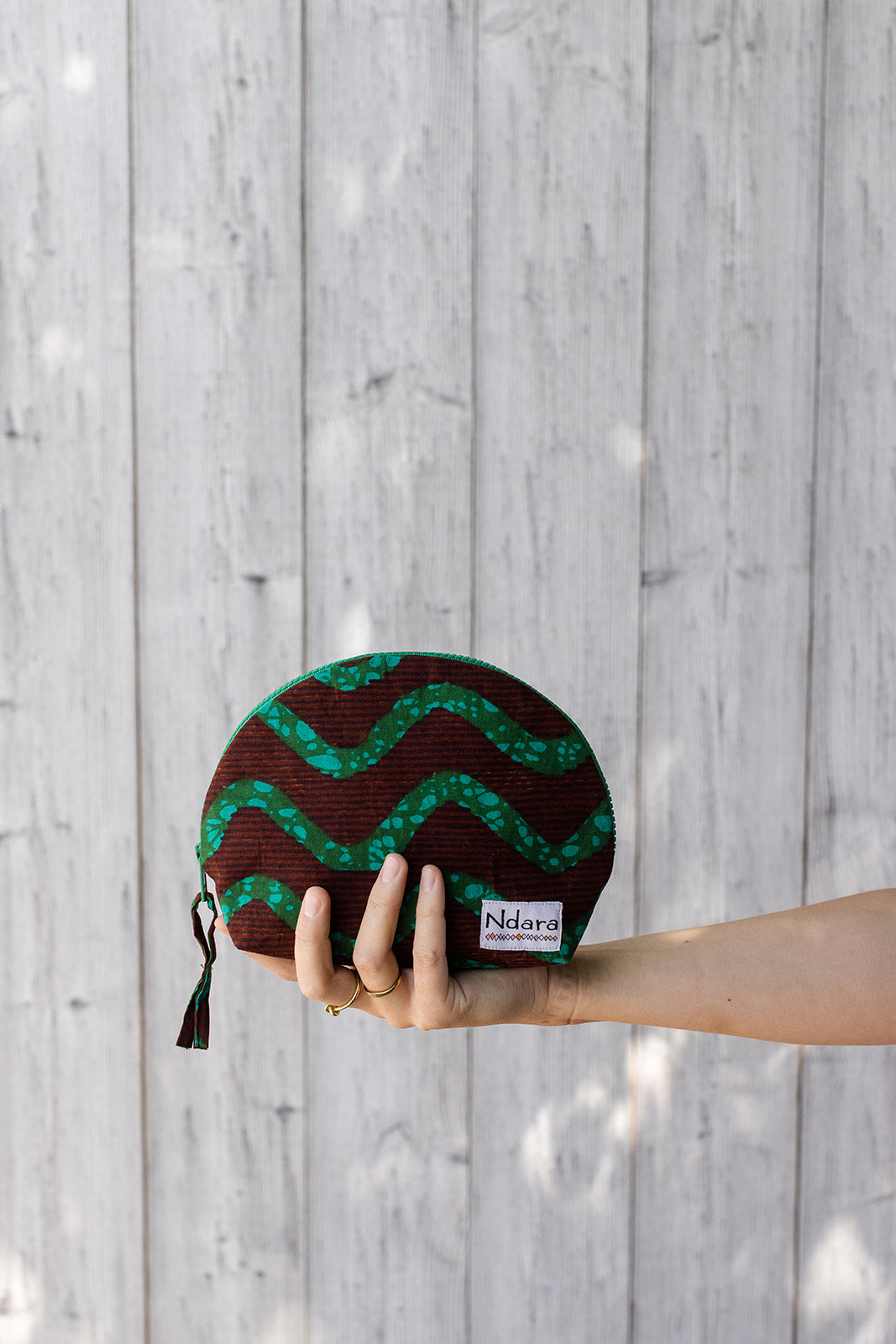 Jocelyne Curve Pouch in Green Stripes