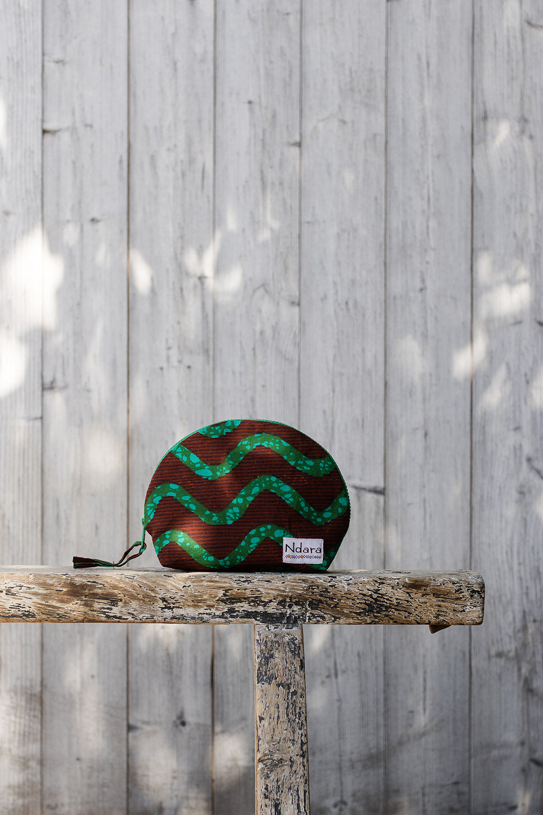 Jocelyne Curve Pouch in Green Stripes