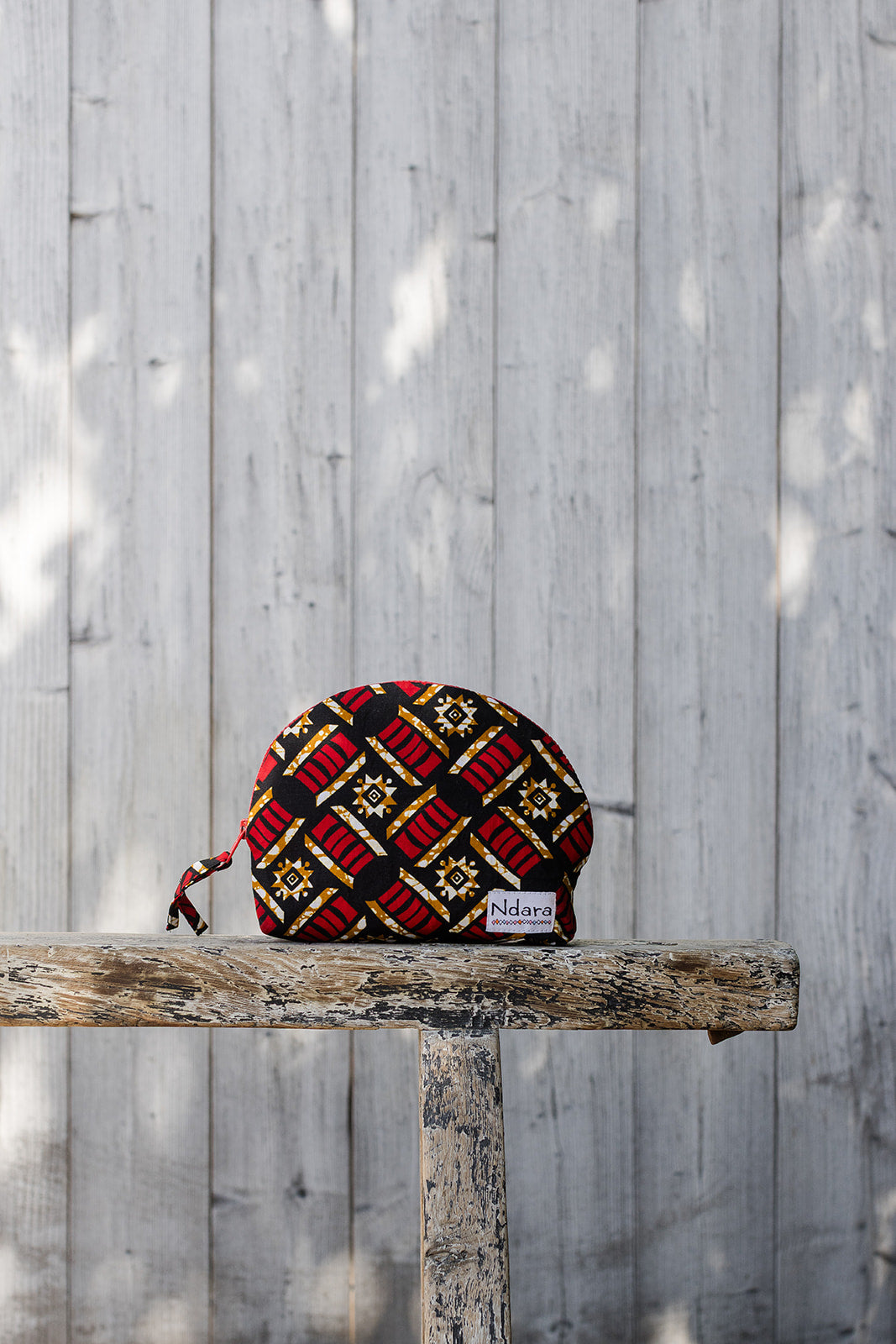 Jocelyne Curve Pouch in Red Pods