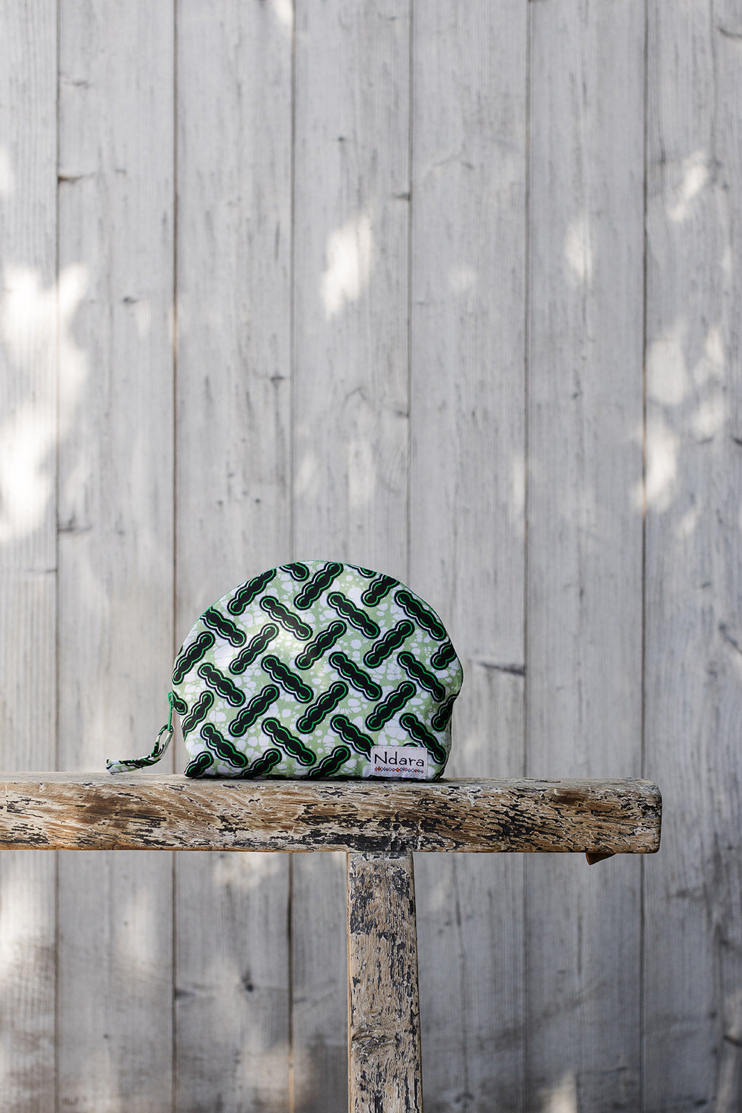 Jocelyne Curve Pouch in Green Beans