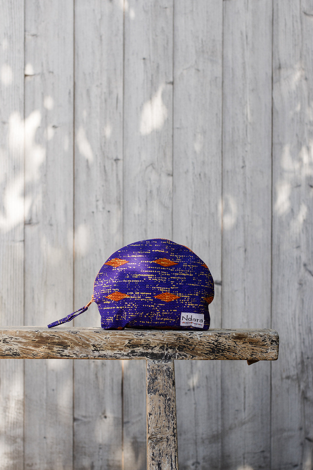 Jocelyne Curve Pouch in Violet
