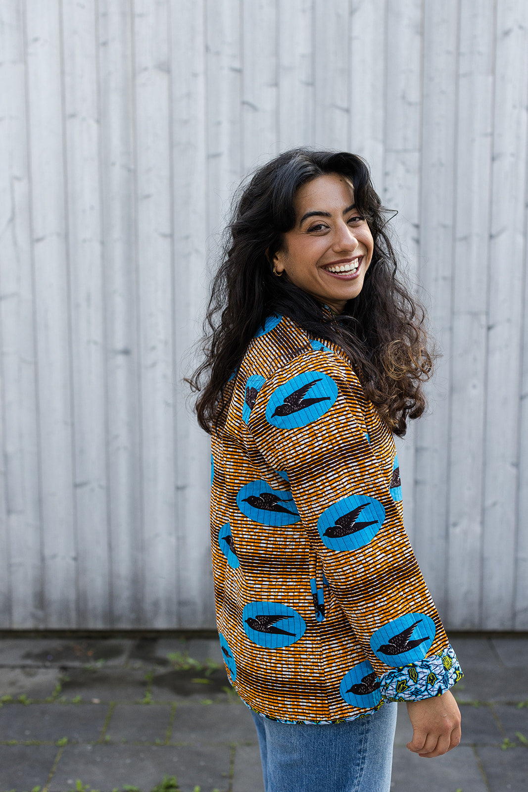 Omega Reversible Jacket in Tangerine Swallows