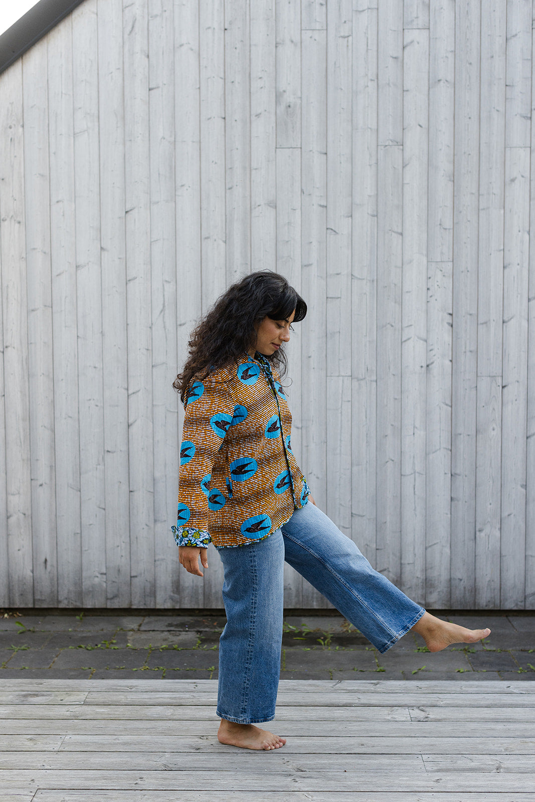 Omega Reversible Jacket in Tangerine Swallows