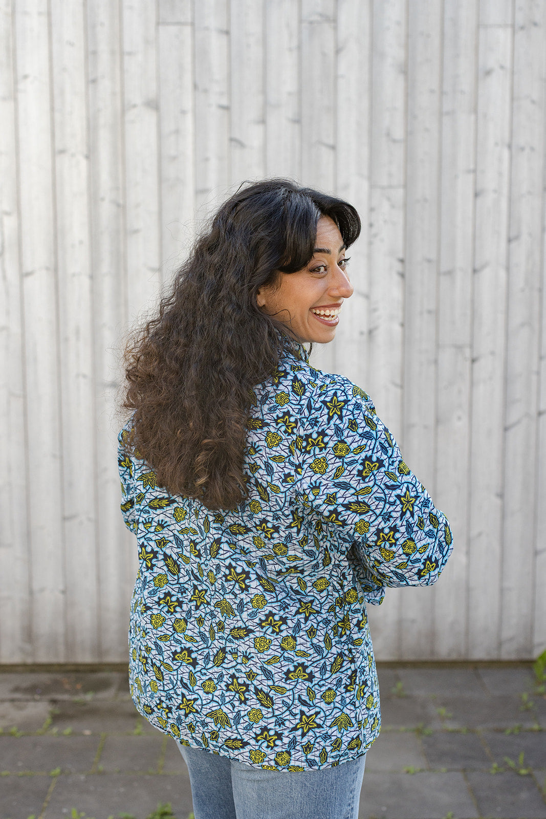 Omega Reversible Jacket in Tangerine Swallows